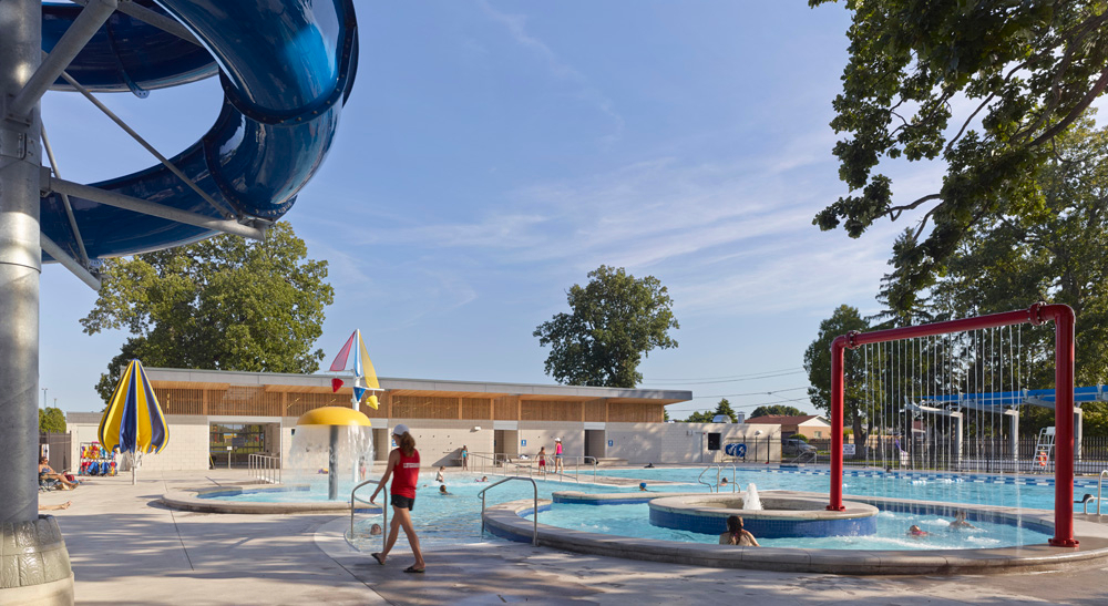 Leisure area with lazy river, water slide, water umbrella, and spraying arch at Fairgrounds Aqua Park in Strathroy, Ontario